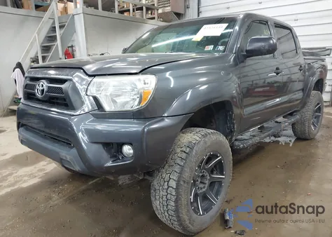 2015 Toyota Tacoma Base V6 z USA, uszkodzony, nr VIN 3TMLU4EN9FM206890
